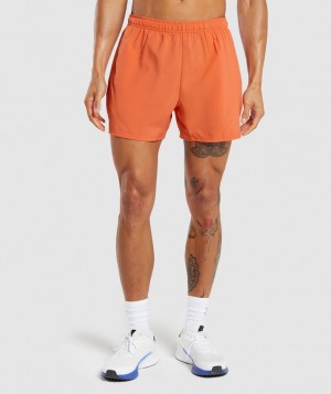 Short Gymshark Arrival 5" Shorts Naranjas | HUXLE6374